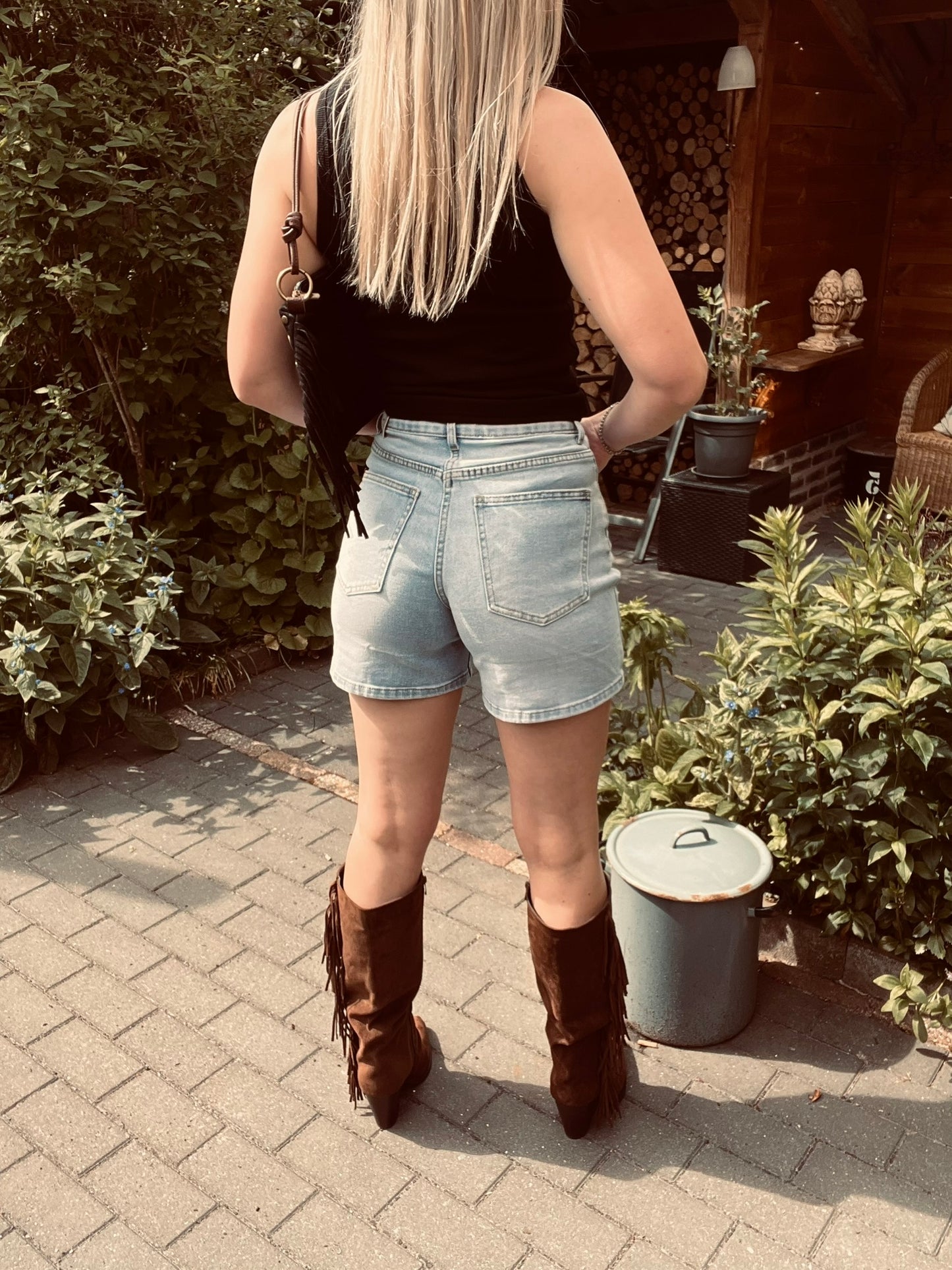 Blauwe denim asymmetrische korte broek